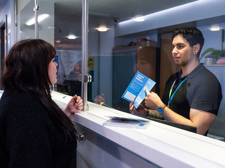 A member of staff and a student at Rotherham College