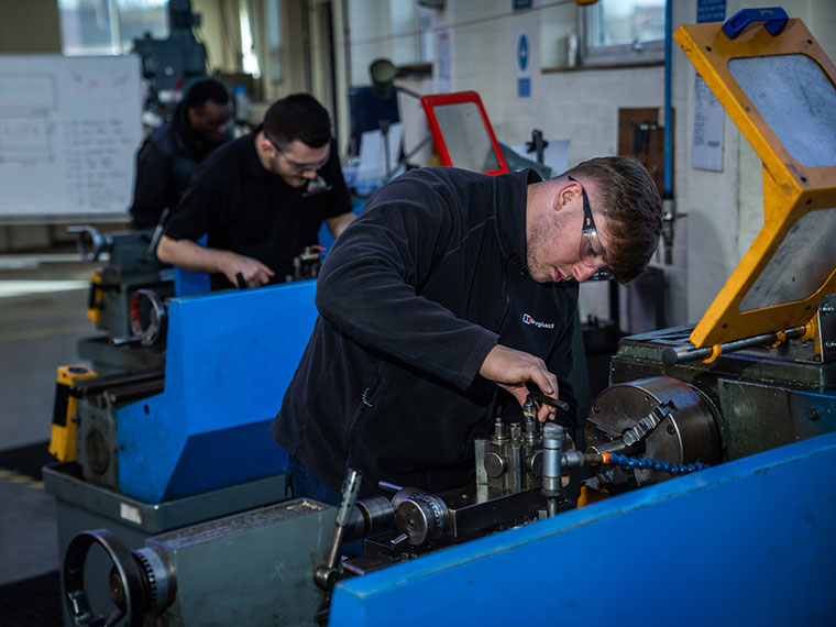 Engineering students in the workshop