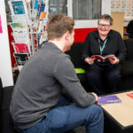 A careers adviser talking to a student