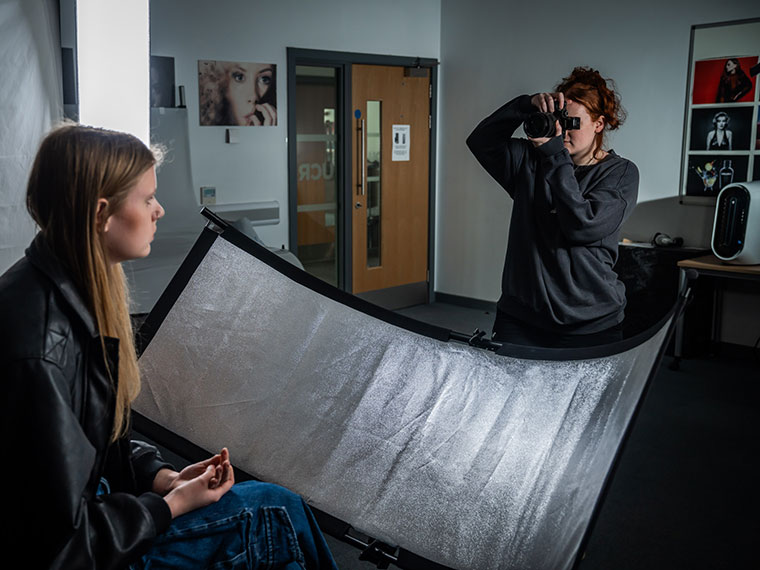 Photography students working on a project