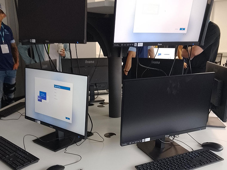 Computers and keyboards on a desk