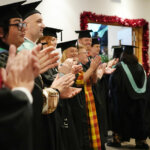 Students leaving the graduation ceremony