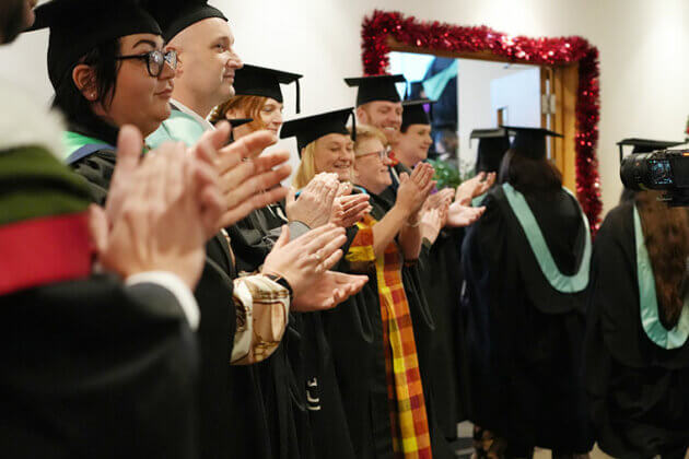 Students leaving the graduation ceremony