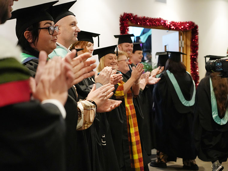 Students leaving the graduation ceremony