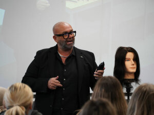 Hairdressing expert Simon Shaw giving a talk to our hairdressing students