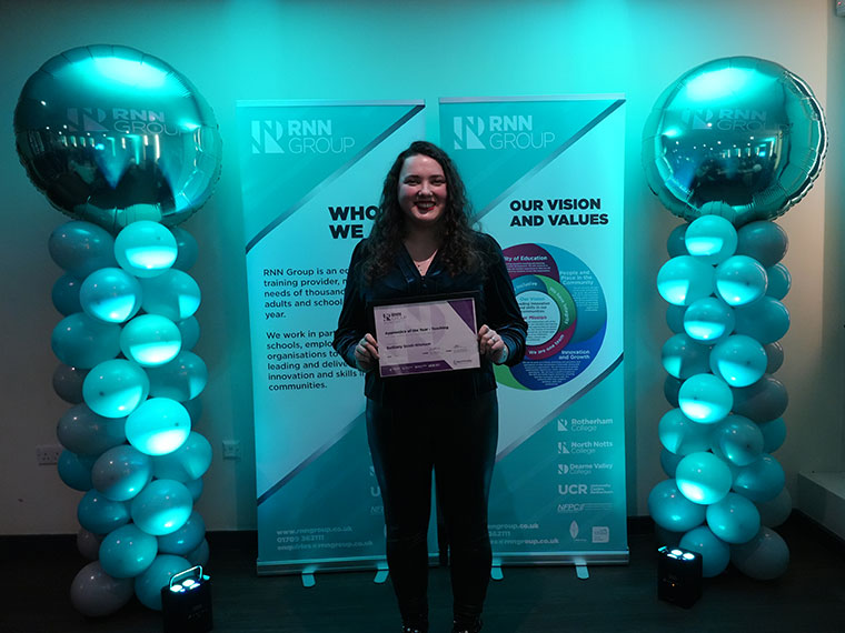 Someone receiving their award at the RNN Group's Annual Apprenticeship Awards 2025